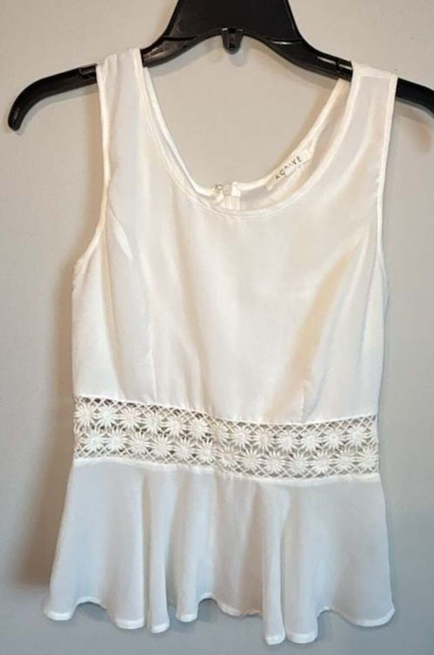 Active White Sleeveless Blouse with Crochet Lace Waist and Flounce Hem